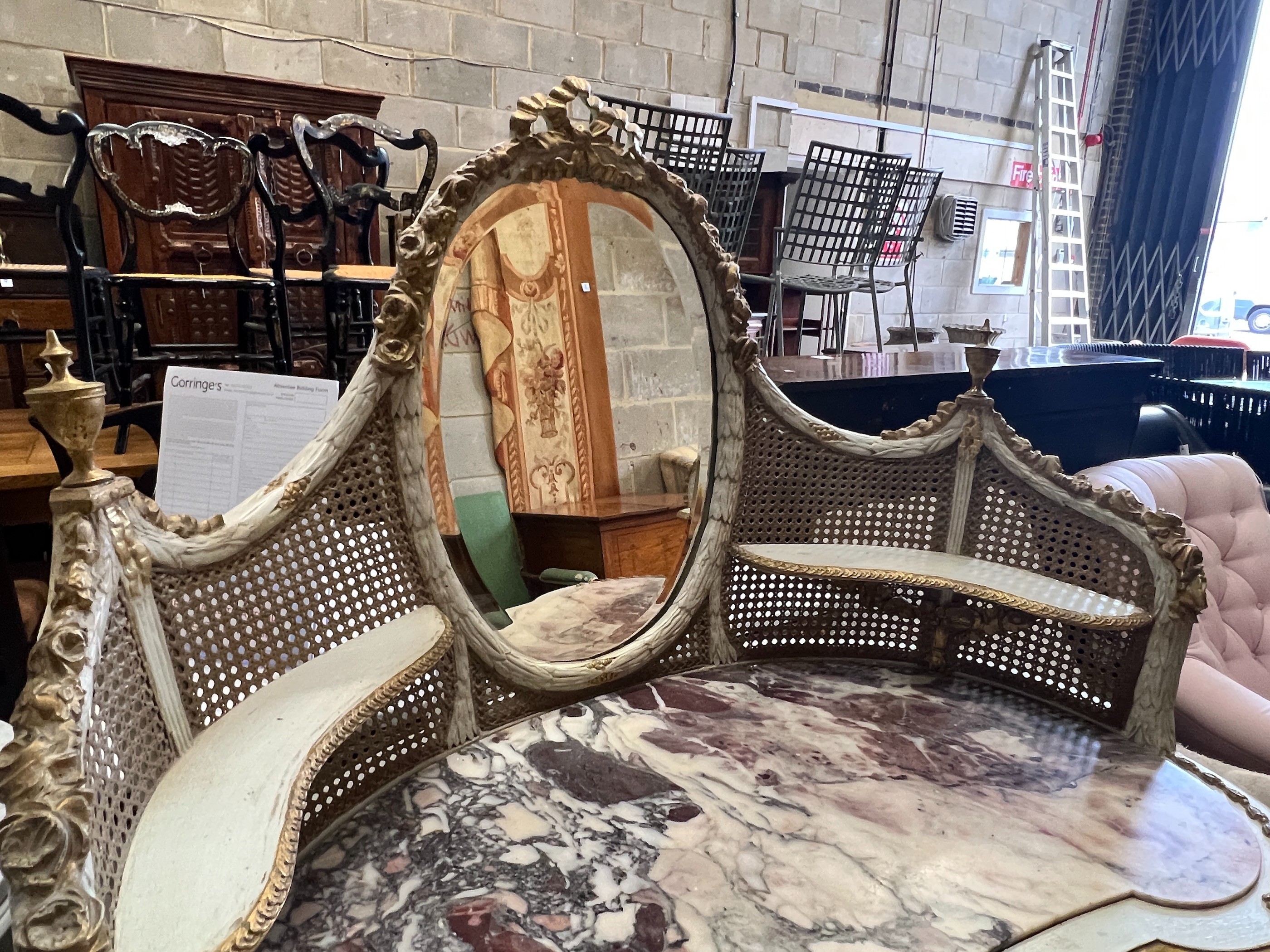 An early 20th century unusual French painted parcel gilt caned marble topped kidney shaped dressing table, width 91cm, depth 50cm, height 138cm and a stool